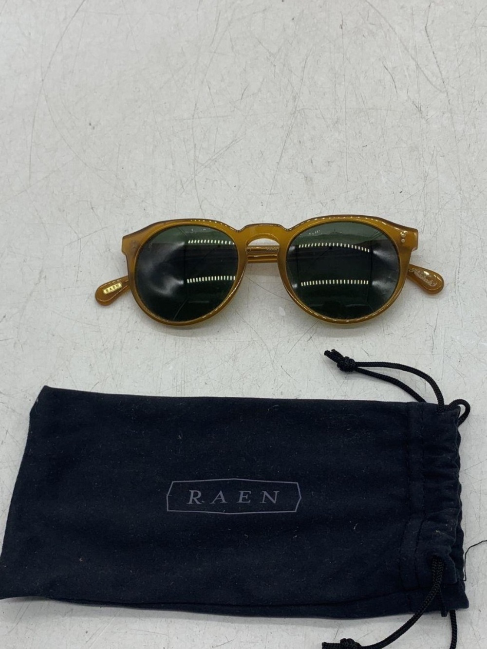 RAEN Unisex Remmy 49 Round Sunglasses in Honey Amber Frame with Dark Green Lense